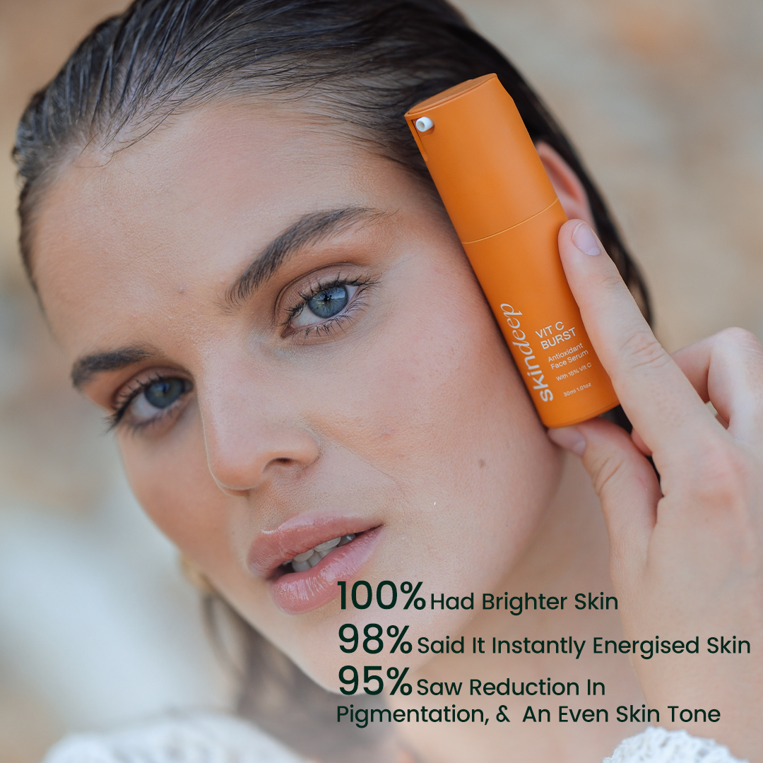 Model holding Vitamin C serum for brighter skin